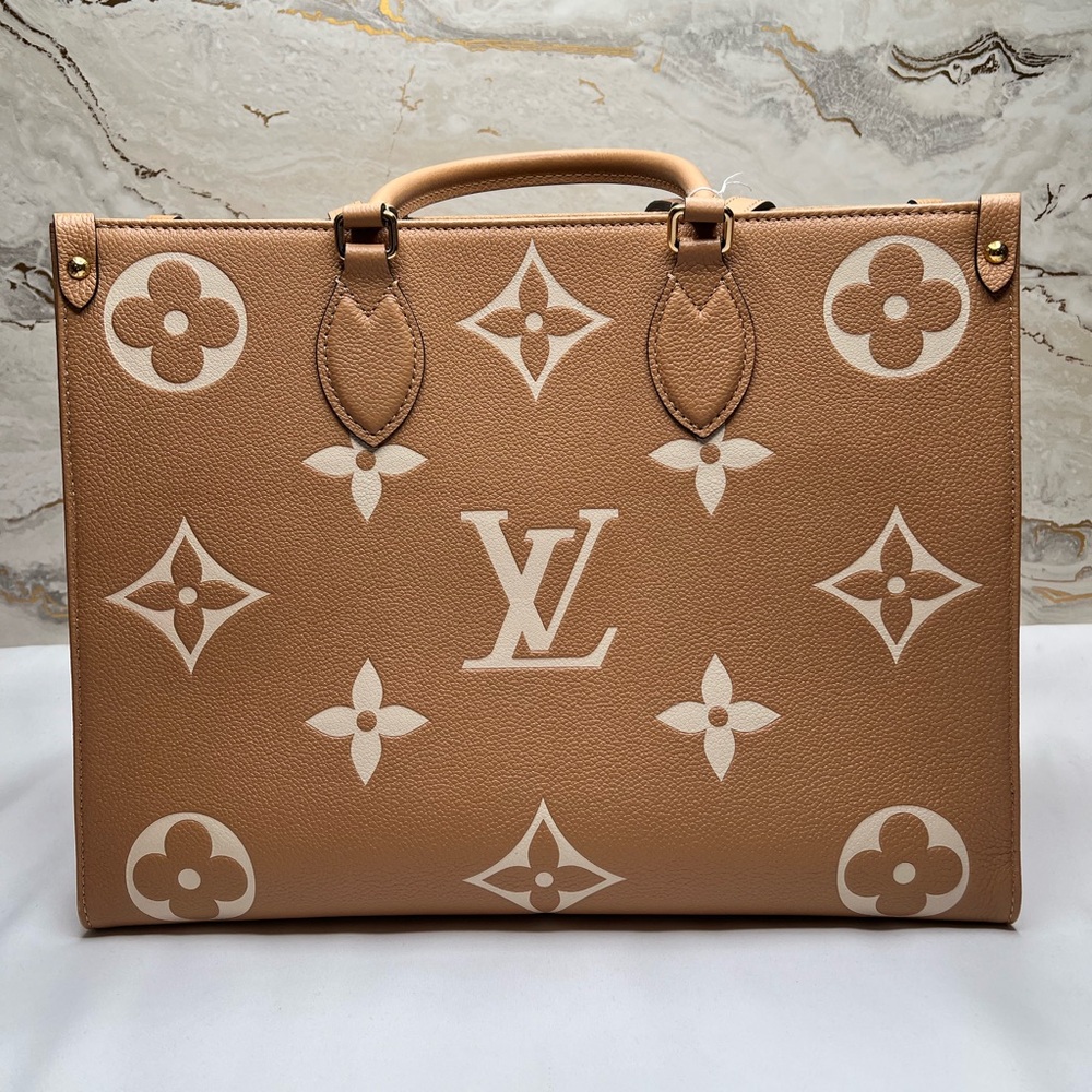 #023030VX Louis Vuitton OTG MM